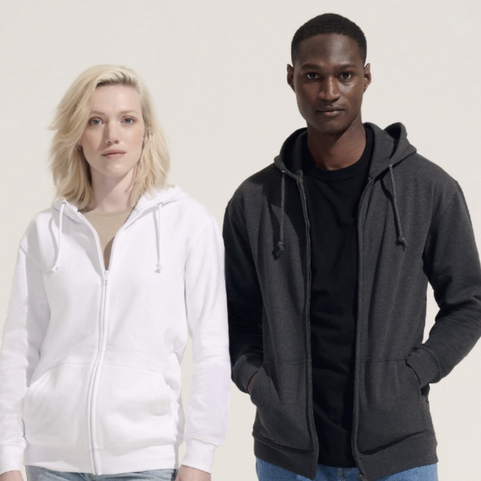 Two people wearing white and dark grey zip hoodies
