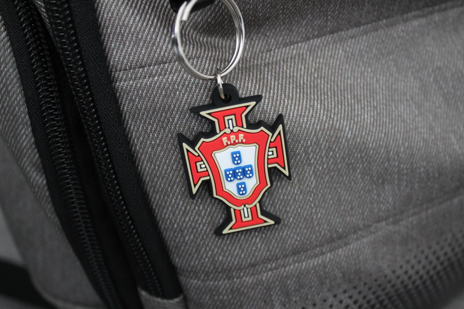Portuguese Football Federation rubber crest keyring attached to a backpack
